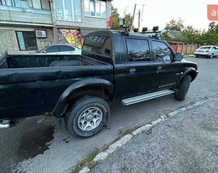 Чорний Міцубісі Л 200, об'ємом двигуна 2.5 л та пробігом 240 тис. км за 6054 $, фото 2 на Automoto.ua