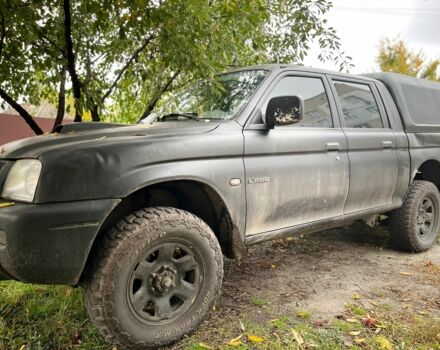 Чорний Міцубісі Л 200, об'ємом двигуна 2.5 л та пробігом 3 тис. км за 3700 $, фото 1 на Automoto.ua