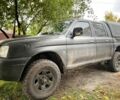Чорний Міцубісі Л 200, об'ємом двигуна 2.5 л та пробігом 3 тис. км за 3700 $, фото 1 на Automoto.ua