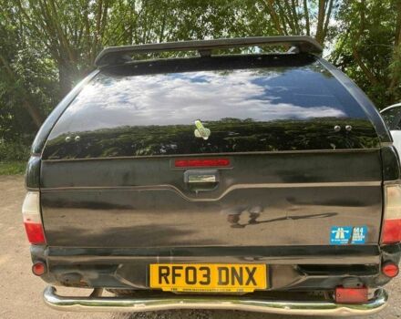 Черный Мицубиси Л 200, объемом двигателя 0 л и пробегом 150 тыс. км за 4667 $, фото 7 на Automoto.ua