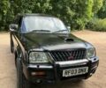 Черный Мицубиси Л 200, объемом двигателя 0 л и пробегом 150 тыс. км за 4667 $, фото 2 на Automoto.ua