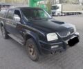 Чорний Міцубісі Л 200, об'ємом двигуна 2.5 л та пробігом 120 тис. км за 5026 $, фото 1 на Automoto.ua