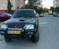 Чорний Міцубісі Л 200, об'ємом двигуна 2.5 л та пробігом 240 тис. км за 6054 $, фото 1 на Automoto.ua