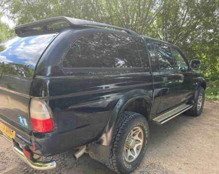 Черный Мицубиси Л 200, объемом двигателя 0 л и пробегом 150 тыс. км за 4667 $, фото 6 на Automoto.ua