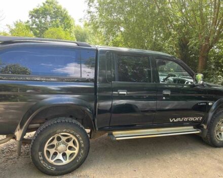 Черный Мицубиси Л 200, объемом двигателя 0 л и пробегом 150 тыс. км за 4667 $, фото 1 на Automoto.ua