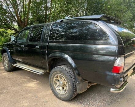 Черный Мицубиси Л 200, объемом двигателя 0 л и пробегом 150 тыс. км за 4667 $, фото 8 на Automoto.ua