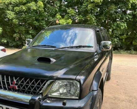 Черный Мицубиси Л 200, объемом двигателя 0 л и пробегом 150 тыс. км за 4667 $, фото 10 на Automoto.ua