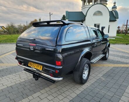 Черный Мицубиси Л 200, объемом двигателя 2.5 л и пробегом 156 тыс. км за 7521 $, фото 9 на Automoto.ua