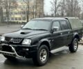 Черный Мицубиси Л 200, объемом двигателя 2.5 л и пробегом 170 тыс. км за 4250 $, фото 6 на Automoto.ua