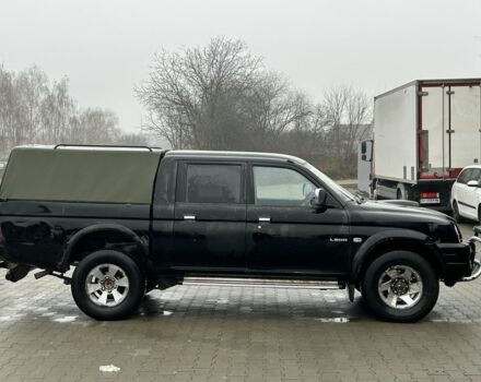 Черный Мицубиси Л 200, объемом двигателя 2.5 л и пробегом 170 тыс. км за 4250 $, фото 1 на Automoto.ua