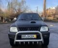 Черный Мицубиси Л 200, объемом двигателя 2.5 л и пробегом 250 тыс. км за 5300 $, фото 2 на Automoto.ua