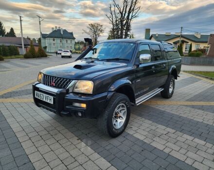 Черный Мицубиси Л 200, объемом двигателя 2.5 л и пробегом 156 тыс. км за 7521 $, фото 5 на Automoto.ua