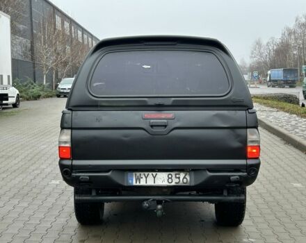 Черный Мицубиси Л 200, объемом двигателя 2.5 л и пробегом 250 тыс. км за 4250 $, фото 3 на Automoto.ua