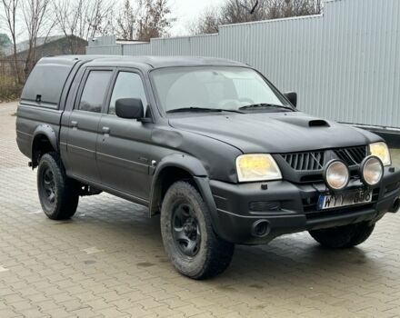 Черный Мицубиси Л 200, объемом двигателя 2.5 л и пробегом 250 тыс. км за 4250 $, фото 6 на Automoto.ua