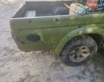 Черный Мицубиси Л 200, объемом двигателя 2.5 л и пробегом 190 тыс. км за 5500 $, фото 2 на Automoto.ua