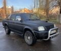 Черный Мицубиси Л 200, объемом двигателя 2.5 л и пробегом 250 тыс. км за 5300 $, фото 1 на Automoto.ua