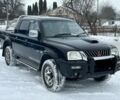 Чорний Міцубісі Л 200, об'ємом двигуна 2.5 л та пробігом 150 тис. км за 4750 $, фото 1 на Automoto.ua