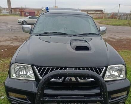 Чорний Міцубісі Л 200, об'ємом двигуна 2.5 л та пробігом 300 тис. км за 4200 $, фото 3 на Automoto.ua