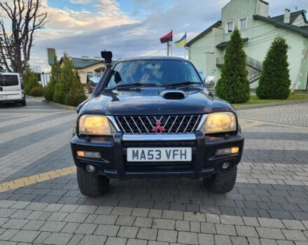 Черный Мицубиси Л 200, объемом двигателя 2.5 л и пробегом 156 тыс. км за 7521 $, фото 3 на Automoto.ua