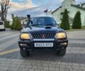 Черный Мицубиси Л 200, объемом двигателя 2.5 л и пробегом 156 тыс. км за 7521 $, фото 3 на Automoto.ua
