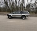 Чорний Міцубісі Л 200, об'ємом двигуна 2.5 л та пробігом 168 тис. км за 4999 $, фото 1 на Automoto.ua