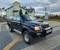 Черный Мицубиси Л 200, объемом двигателя 2.5 л и пробегом 156 тыс. км за 7521 $, фото 2 на Automoto.ua