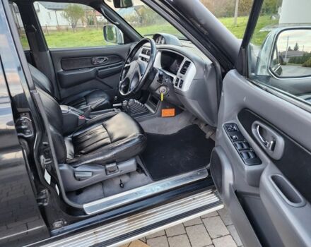 Черный Мицубиси Л 200, объемом двигателя 2.5 л и пробегом 156 тыс. км за 7521 $, фото 11 на Automoto.ua