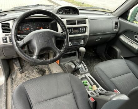 Черный Мицубиси Л 200, объемом двигателя 2.5 л и пробегом 250 тыс. км за 4250 $, фото 10 на Automoto.ua