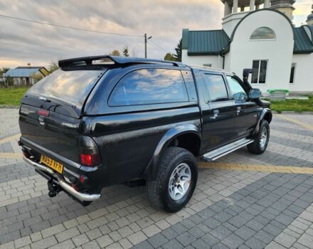 Черный Мицубиси Л 200, объемом двигателя 2.5 л и пробегом 156 тыс. км за 7521 $, фото 10 на Automoto.ua