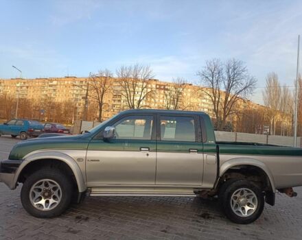 Черный Мицубиси Л 200, объемом двигателя 2.5 л и пробегом 300 тыс. км за 5100 $, фото 4 на Automoto.ua