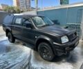 Черный Мицубиси Л 200, объемом двигателя 2.5 л и пробегом 150 тыс. км за 3300 $, фото 1 на Automoto.ua