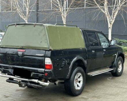 Черный Мицубиси Л 200, объемом двигателя 2.5 л и пробегом 170 тыс. км за 4250 $, фото 2 на Automoto.ua