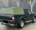 Черный Мицубиси Л 200, объемом двигателя 2.5 л и пробегом 170 тыс. км за 4250 $, фото 2 на Automoto.ua