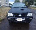 Чорний Міцубісі Л 200, об'ємом двигуна 0 л та пробігом 150 тис. км за 5400 $, фото 1 на Automoto.ua