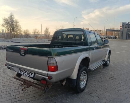 Черный Мицубиси Л 200, объемом двигателя 2.5 л и пробегом 300 тыс. км за 5100 $, фото 3 на Automoto.ua