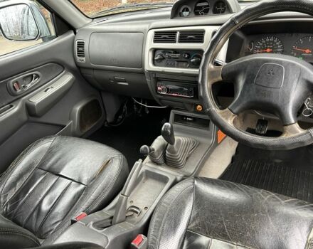 Черный Мицубиси Л 200, объемом двигателя 2.5 л и пробегом 170 тыс. км за 4250 $, фото 10 на Automoto.ua