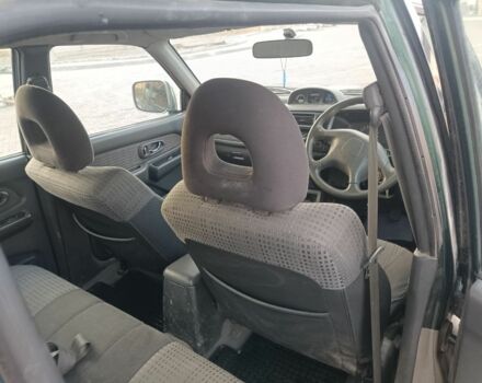 Черный Мицубиси Л 200, объемом двигателя 2.5 л и пробегом 300 тыс. км за 5100 $, фото 6 на Automoto.ua