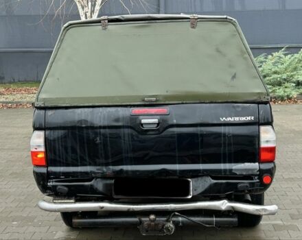 Черный Мицубиси Л 200, объемом двигателя 2.5 л и пробегом 170 тыс. км за 4250 $, фото 3 на Automoto.ua