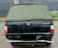 Черный Мицубиси Л 200, объемом двигателя 2.5 л и пробегом 170 тыс. км за 4250 $, фото 3 на Automoto.ua