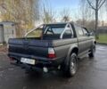 Черный Мицубиси Л 200, объемом двигателя 2.5 л и пробегом 250 тыс. км за 5300 $, фото 3 на Automoto.ua