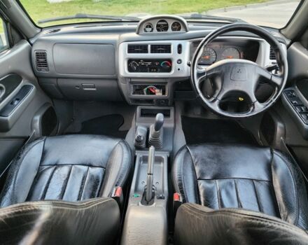 Черный Мицубиси Л 200, объемом двигателя 2.5 л и пробегом 156 тыс. км за 7521 $, фото 20 на Automoto.ua