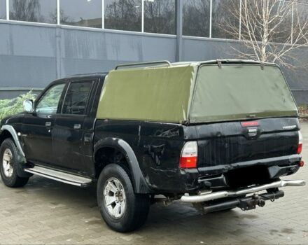 Черный Мицубиси Л 200, объемом двигателя 2.5 л и пробегом 170 тыс. км за 4250 $, фото 4 на Automoto.ua