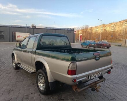 Черный Мицубиси Л 200, объемом двигателя 2.5 л и пробегом 300 тыс. км за 5100 $, фото 2 на Automoto.ua