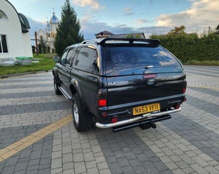 Черный Мицубиси Л 200, объемом двигателя 2.5 л и пробегом 156 тыс. км за 7521 $, фото 7 на Automoto.ua
