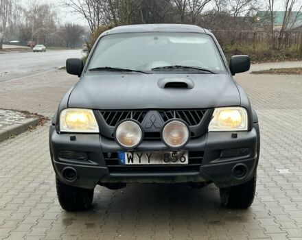 Черный Мицубиси Л 200, объемом двигателя 2.5 л и пробегом 250 тыс. км за 4250 $, фото 7 на Automoto.ua