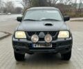 Черный Мицубиси Л 200, объемом двигателя 2.5 л и пробегом 250 тыс. км за 4250 $, фото 7 на Automoto.ua