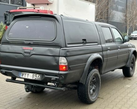 Черный Мицубиси Л 200, объемом двигателя 2.5 л и пробегом 250 тыс. км за 4250 $, фото 4 на Automoto.ua