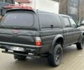 Черный Мицубиси Л 200, объемом двигателя 2.5 л и пробегом 250 тыс. км за 4250 $, фото 4 на Automoto.ua