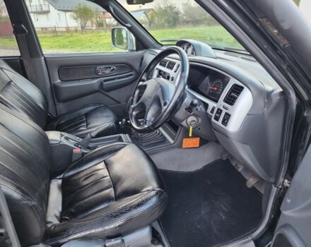 Черный Мицубиси Л 200, объемом двигателя 2.5 л и пробегом 156 тыс. км за 7521 $, фото 12 на Automoto.ua