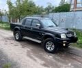 Чорний Міцубісі Л 200, об'ємом двигуна 2.5 л та пробігом 165 тис. км за 5900 $, фото 1 на Automoto.ua